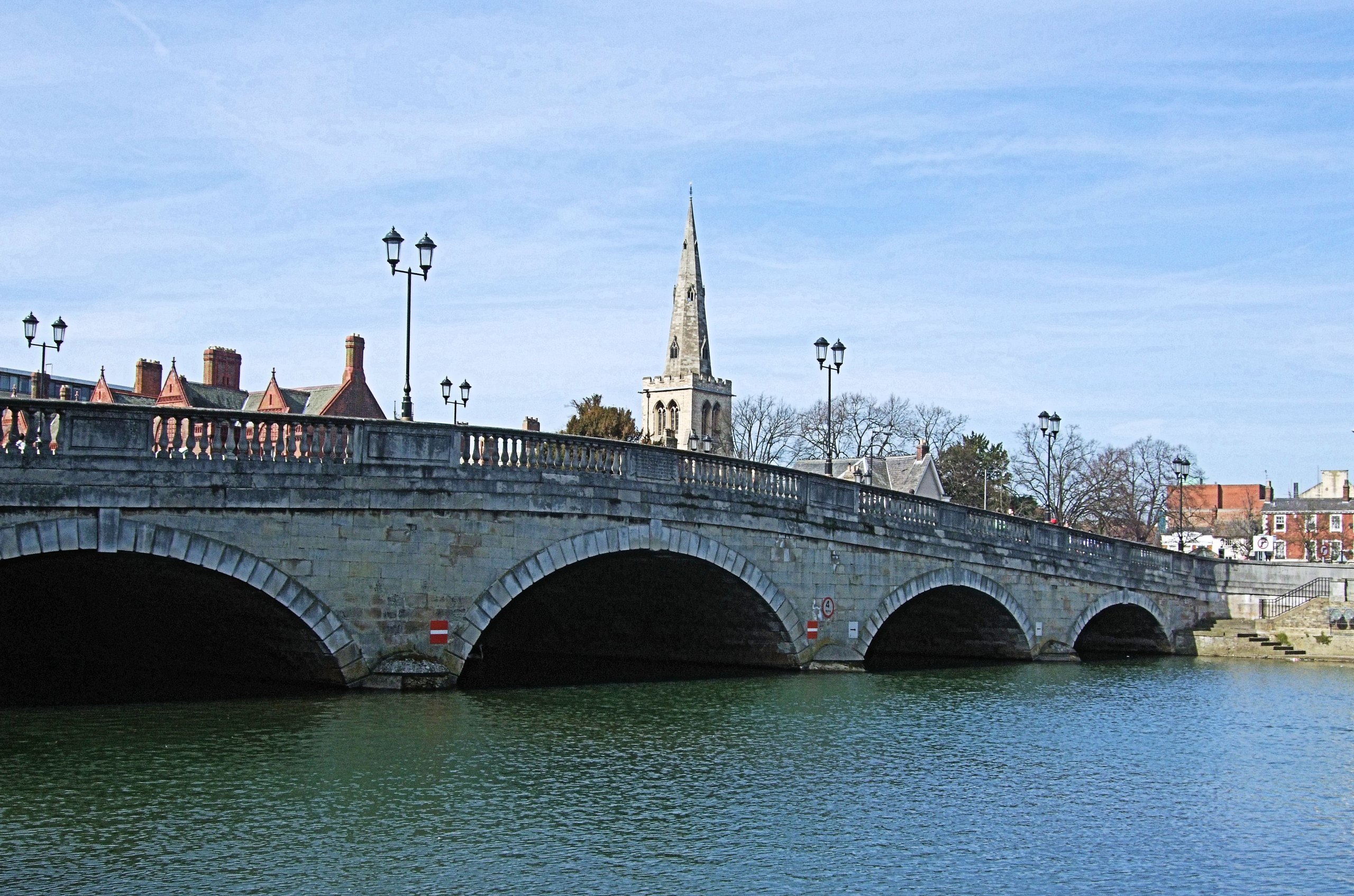 Bedford Town Bridge over the River Great Ouse with the church spire behind