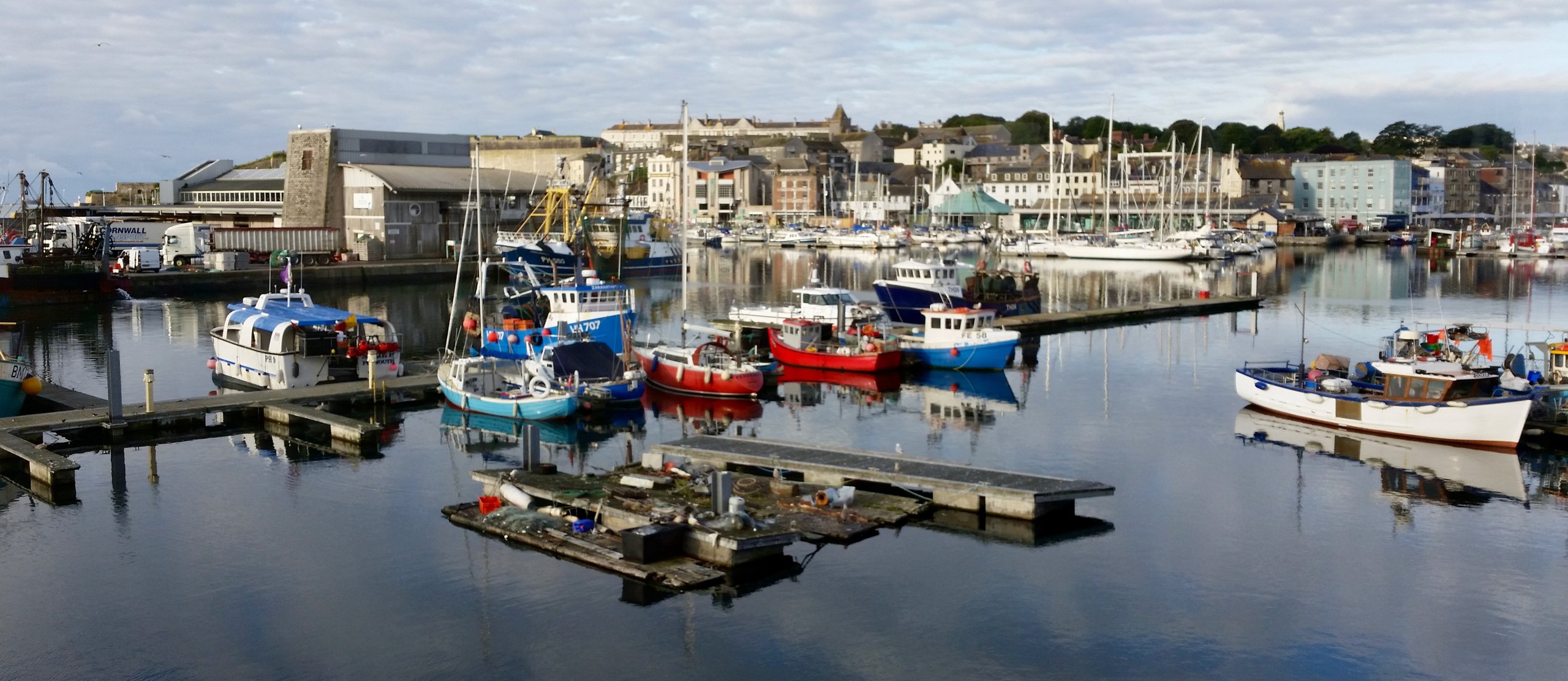Boats moored in Sutton Harbour beside the Barbican in Plymouth